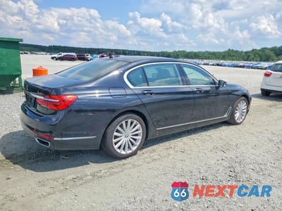 Trzecie zdjęcie samochodu z tyłu: 2016 BMW 740 I VIN:WBA7E2C50GGD99982 - miniatura