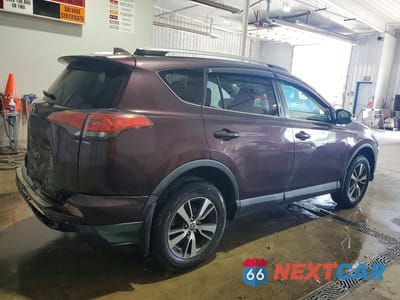 Trzecie zdjęcie samochodu z tyłu: 2018 TOYOTA RAV4 XLE VIN:2T3RFREV3JW787392 - miniatura