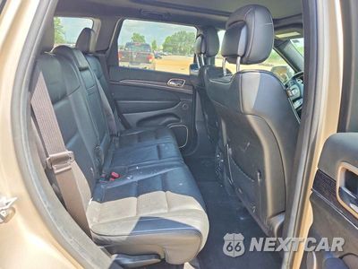 Zdjęcie 11 z 13 samochodu: 2014 JEEP GRAND CHEROKEE SUMMIT VIN:1C4RJEJT2EC359592 - miniatura