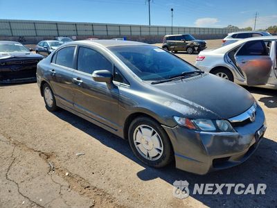 Czwarte zdjęcie samochodu z boku: 2010 HONDA CIVIC HYBRID VIN:JHMFA3F26AS006911 - miniatura