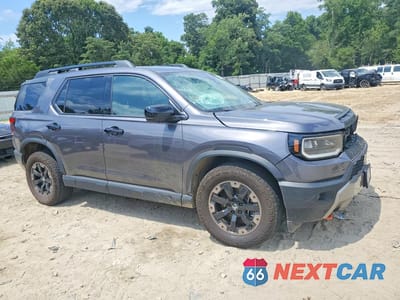 Czwarte zdjęcie samochodu z boku: 2026 HONDA PASSPORT TRAILSPORT ELITE VIN:5FNYF9H80TB006581 - miniatura