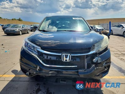 Piąte zdjęcie samochodu w środku: 2016 HONDA CR-V LX VIN:5J6RM4H35GL003058 - miniatura