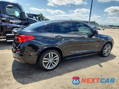 Trzecie zdjęcie samochodu z tyłu: 2016 BMW X4 XDRIVE35I VIN:5UXXW5C5XG0N92775 - miniatura