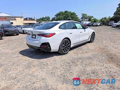 Czwarte zdjęcie samochodu z boku: 2026 BMW I4 XDRIVE 40 VIN:WBY43HD02TFW29955 - miniatura
