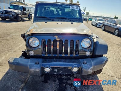 Piąte zdjęcie samochodu w środku: 2015 JEEP WRANGLER SPORT VIN:1C4AJWAG0FL724231 - miniatura