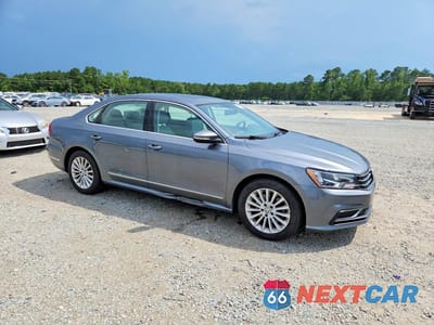 Czwarte zdjęcie samochodu z boku: 2016 VOLKSWAGEN PASSAT SE VIN:1VWBS7A39GC052480 - miniatura