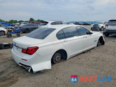 Trzecie zdjęcie samochodu z tyłu: 2013 BMW 750 LXI VIN:WBAYF8C5XDD139930 - miniatura