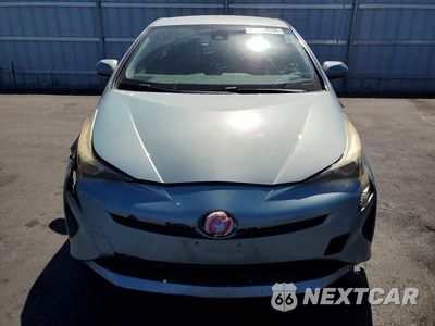 Piąte zdjęcie samochodu w środku: 2017 TOYOTA PRIUS TWO VIN:JTDKBRFU6H3032561 - miniatura