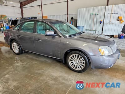 Czwarte zdjęcie samochodu z boku: 2006 MERCURY MONTEGO PREMIER VIN:1MEHM42176G616619 - miniatura