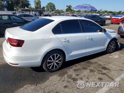 Trzecie zdjęcie samochodu z tyłu: 2017 VOLKSWAGEN JETTA SE VIN:3VWDB7AJXHM295741 - miniatura
