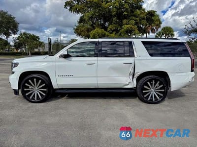 Zdjęcie 12 z 15 samochodu: 2015 CHEVROLET SUBURBAN C1500 LT VIN:1GNSCJKC8FR505342 - miniatura
