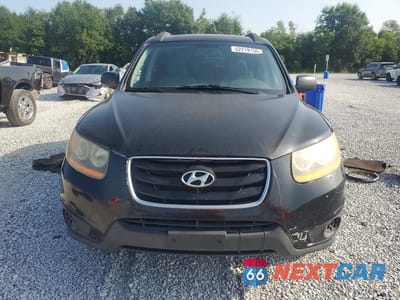 Piąte zdjęcie samochodu w środku: 2010 HYUNDAI SANTA FE GLS VIN:5NMSG3AB4AH403518 - miniatura