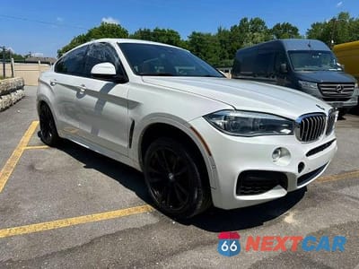 Czwarte zdjęcie samochodu z boku: 2018 BMW X6 XDRIVE50I VIN:5UXKU6C59J0W38979 - miniatura