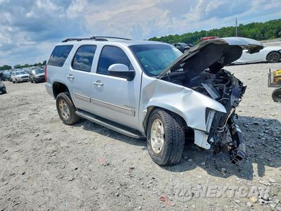 Czwarte zdjęcie samochodu z boku: 2013 CHEVROLET TAHOE C1500 LT VIN:1GNSCBE06DR156492 - miniatura