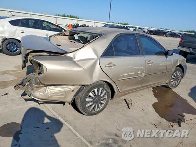 Trzecie zdjęcie samochodu z tyłu: 2002 TOYOTA CAMRY LE VIN:JTDBE32K120019704 - miniatura