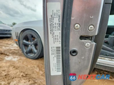 Zdjęcie 12 z 12 samochodu: 2013 DODGE CHALLENGER R/T VIN:2C3CDYBTXDH619489 - miniatura