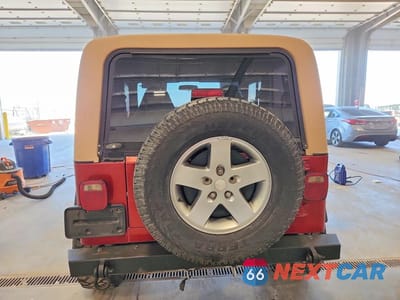 Zdjęcie 6 z 12 samochodu: 1999 JEEP WRANGLER / TJ SPORT VIN:1J4FY19S1XP431293 - miniatura