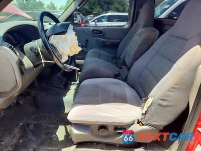 Zdjęcie 7 z 12 samochodu: 2002 FORD F150 VIN:2FTRF072X2CA87933 - miniatura