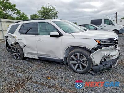Czwarte zdjęcie samochodu z boku: 2024 HONDA PILOT TOURING VIN:5FNYG1H7XRB041191 - miniatura