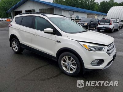 Czwarte zdjęcie samochodu z boku: 2018 FORD ESCAPE SE VIN:1FMCU9GD0JUC24485 - miniatura
