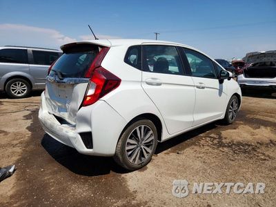 Trzecie zdjęcie samochodu z tyłu: 2015 HONDA FIT EX VIN:3HGGK5G87FM766560 - miniatura