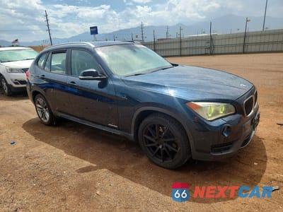 Czwarte zdjęcie samochodu z boku: 2014 BMW X1 XDRIVE28I VIN:WBAVL1C5XEVY10950 - miniatura