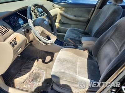 Zdjęcie 7 z 12 samochodu: 2003 TOYOTA COROLLA CE VIN:JTDBR32EX30033195 - miniatura