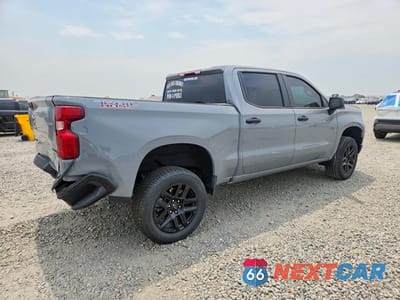Trzecie zdjęcie samochodu z tyłu: 2024 CHEVROLET SILVERADO K1500 TRAIL BOSS CUSTOM VIN:3GCUDCE88RG447092 - miniatura