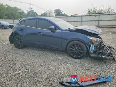 Czwarte zdjęcie samochodu z boku: 2017 MAZDA 3 VIN:3MZBN1L31HM143566 - miniatura