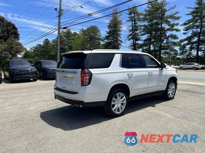 Czwarte zdjęcie samochodu z boku: 2021 CHEVROLET TAHOE K1500 HIGH COUNTRY VIN:1GNSKTKL6MR179746 - miniatura