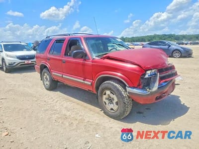 Czwarte zdjęcie samochodu z boku: 2001 CHEVROLET BLAZER VIN:1GNDT13W012187218 - miniatura