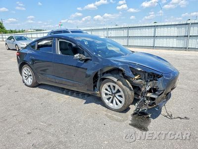 Czwarte zdjęcie samochodu z boku: 2021 TESLA MODEL 3 VIN:5YJ3E1EA4MF917343 - miniatura