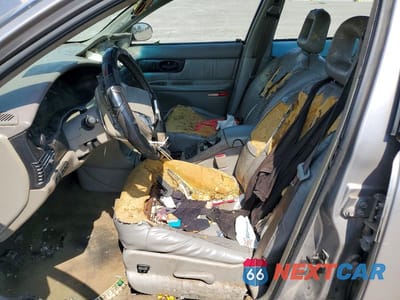 Zdjęcie 7 z 12 samochodu: 1999 BUICK REGAL GS VIN:2G4WF521XX1427370 - miniatura