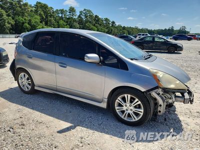 Czwarte zdjęcie samochodu z boku: 2009 HONDA FIT SPORT VIN:JHMGE88479S045443 - miniatura
