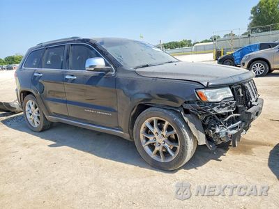 Czwarte zdjęcie samochodu z boku: 2014 JEEP GRAND CHEROKEE SUMMIT VIN:1C4RJFJT9EC346862 - miniatura