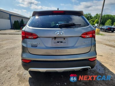 Zdjęcie 6 z 14 samochodu: 2013 HYUNDAI SANTA FE SPORT 2.4L VIN:5XYZU3LB4DG002554 - miniatura