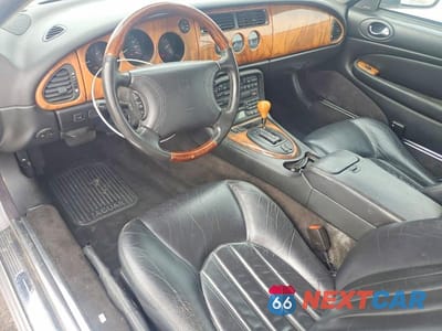 Zdjęcie 8 z 12 samochodu: 2000 JAGUAR XK8 VIN:SAJJA42C2YNA07888 - miniatura