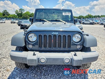 Piąte zdjęcie samochodu w środku: 2016 JEEP WRANGLER UNLIMITED SPORT VIN:1C4HJWDG2GL291345 - miniatura