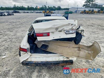 Zdjęcie 6 z 12 samochodu: 1999 TOYOTA CAMRY LE VIN:JT2BG28K0X0340421 - miniatura