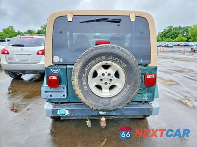 Zdjęcie 6 z 12 samochodu: 2000 JEEP WRANGLER / TJ SAHARA VIN:1J4FA59SXYP770552 - miniatura