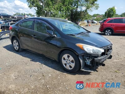 Czwarte zdjęcie samochodu z boku: 2015 KIA FORTE LX VIN:KNAFX4A63F5371095 - miniatura