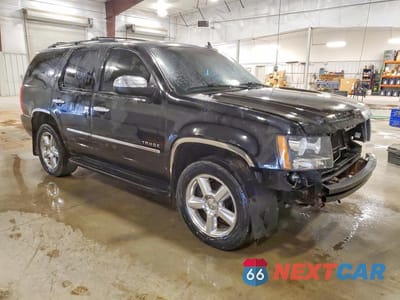 Czwarte zdjęcie samochodu z boku: 2014 CHEVROLET TAHOE K1500 LTZ VIN:1GNSKCE02ER129834 - miniatura