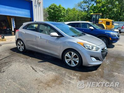 Czwarte zdjęcie samochodu z boku: 2013 HYUNDAI ELANTRA GT BASE VIN:KMHD35LE4DU089918 - miniatura