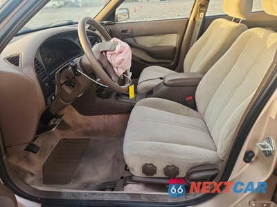 Zdjęcie 7 z 12 samochodu: 1994 TOYOTA CAMRY LE VIN:4T1GK12E8RU048824 - miniatura