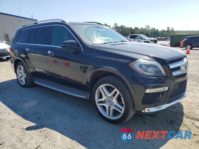 Czwarte zdjęcie samochodu z boku: 2014 MERCEDES-BENZ GL 550 4MATIC VIN:4JGDF7DE8EA400822 - miniatura