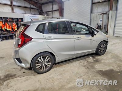 Trzecie zdjęcie samochodu z tyłu: 2016 HONDA FIT EX VIN:JHMGK5H73GX004955 - miniatura