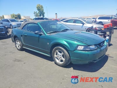 Czwarte zdjęcie samochodu z boku: 2002 FORD MUSTANG VIN:1FAFP44462F233106 - miniatura