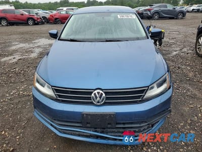 Piąte zdjęcie samochodu w środku: 2017 VOLKSWAGEN JETTA S VIN:3VW2B7AJ8HM331403 - miniatura