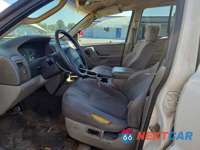 Zdjęcie 7 z 13 samochodu: 2002 JEEP GRAND CHEROKEE LAREDO VIN:1J4GX48S92C172305 - miniatura
