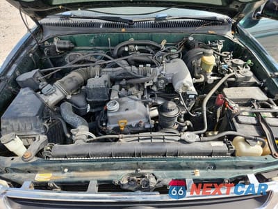 Zdjęcie 11 z 12 samochodu: 2000 TOYOTA TACOMA BASE VIN:4TAWM72NXYZ647234 - miniatura